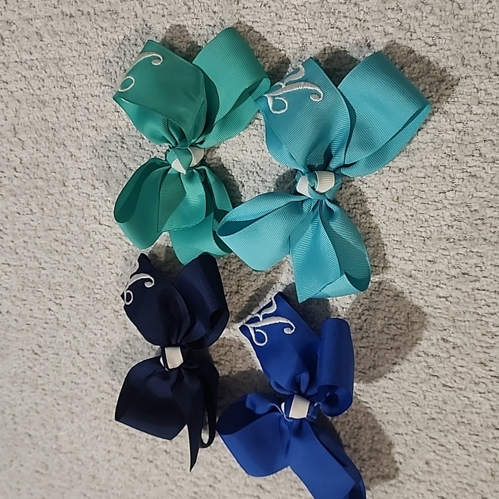 Lot of 4 inital K bows!